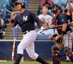 Alex Rodriguez watches a fly ball