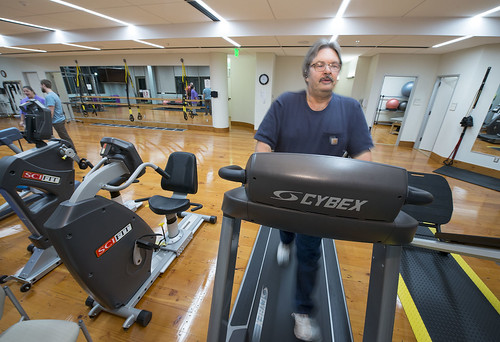 Bill Overstreet works out on the treadmill in the Dena’ina Wellness Center’s activity area. Overstreet has used the tribe's Wellness program to improve his health.