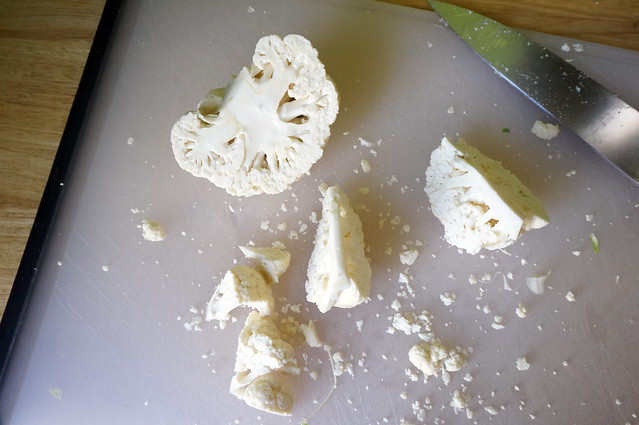 Chunks of cauliflower in various stages of cutting-apart. Poor sad cauliflower. It looks like the boringest brains ever.