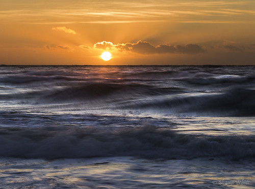 uk greatbritain blue sunset sun beach nature water wales landscape gold coast waves colours place cymru wave ceredigion lightsource llanrhystud shawnwhite canon6d
