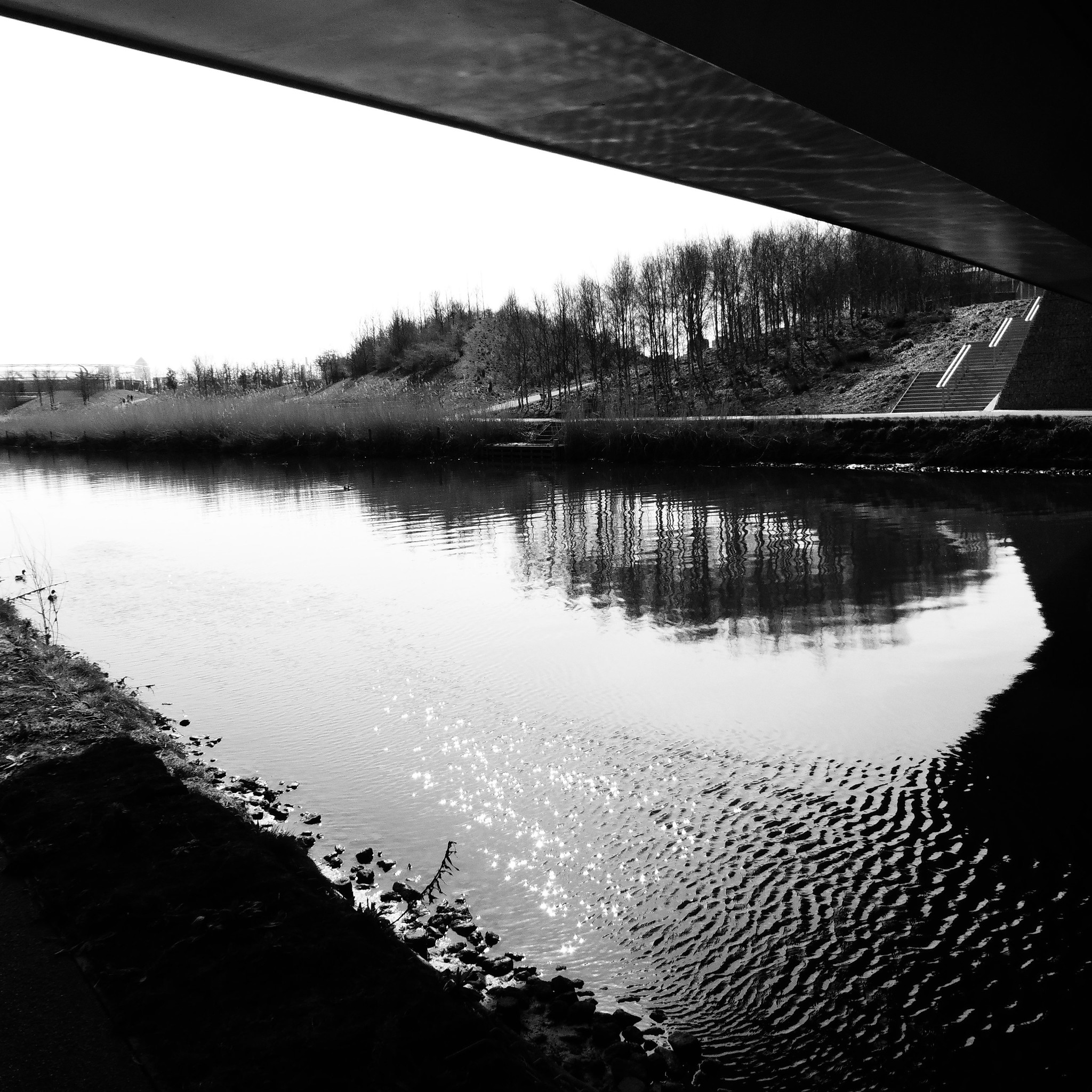 reflection of river in bridge