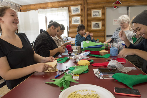 Youth and elders work together at Tyotkas Elder Center on Sept. 4, 2015, to create Christmas ornaments for the U. S. Capitol Christmas Tree.