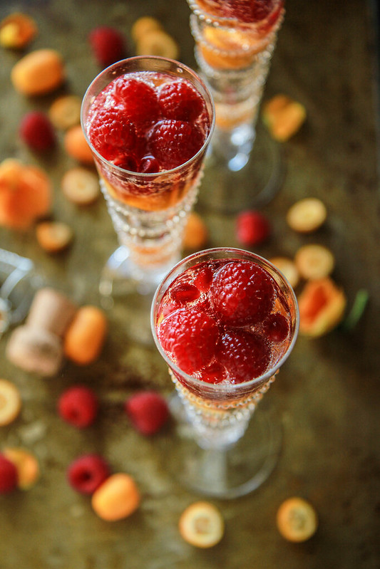 Kumquat Raspberry Rose Champagne Cocktails