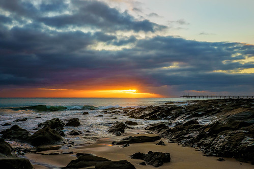 ocean sea seascape beach clouds sunrise outdoors pier rocks surf waves sunbeams lorne a7ii