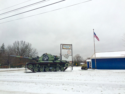 snow building tank michigan flag storefront allegan