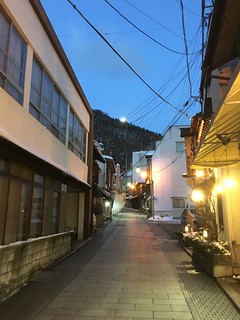 Rising moon in Yudanaka shopping street