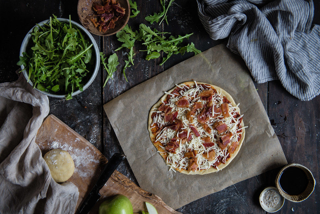 cracker-style thin crust pizza | two red bowls