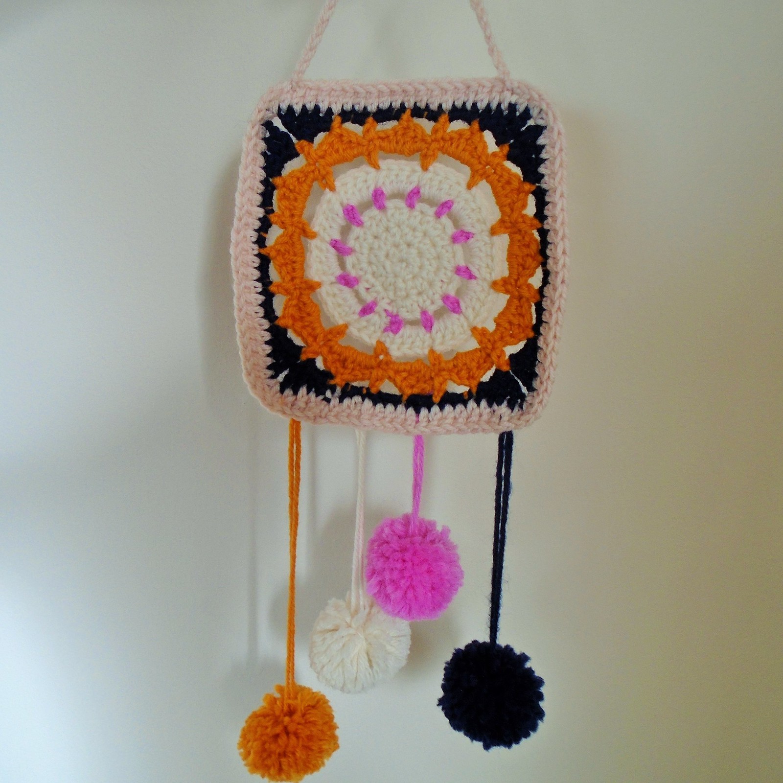 flower power granny square wall hanging by woolapple