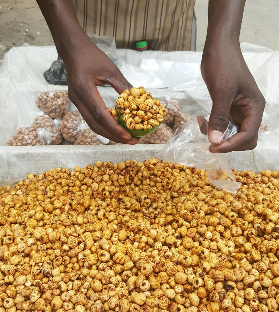 Right on cue @sarahjampel - tigernuts fresh for you. Dried ones at the back. Known as Aya (Hausa), aki Hausa (Igbo), ofio (Yoruba) here in Nigeria, chufas in South America and tiger nuts in English, they make a great snack, a drink known as kunnu aya and