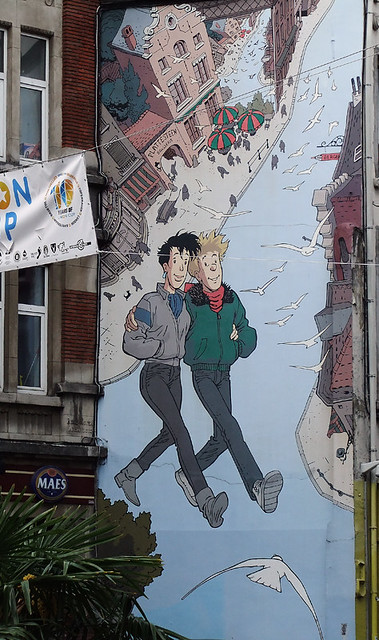 One of many cartoon murals on a wall in Brussels, Belgium