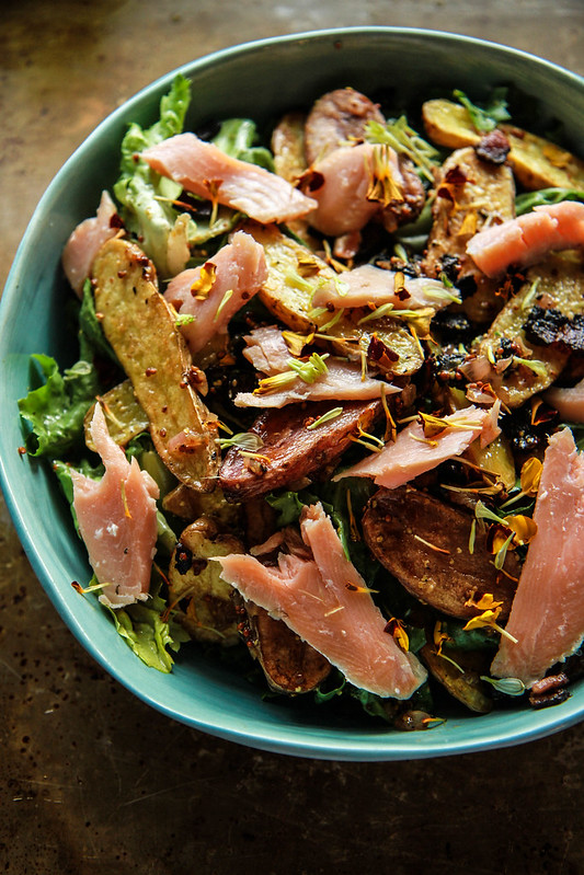 Warm Fingerling Potatoes with Lardons, Greens and Smoked Trout.