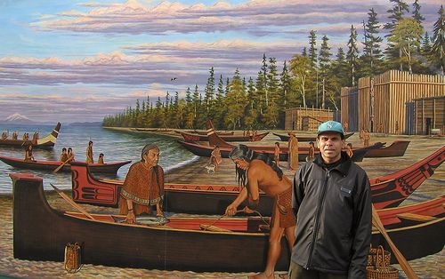 Photo: Jay near a mural on the side of a building near the shore-side visitors' center.
