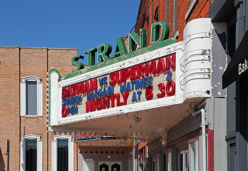 county blue windows sky building brick sign strand marquee lights theater neon letters indiana structure historic shutters halogen lettering tubing angola steuben singlepane batmanvssuperman