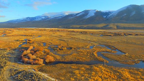 morning winter usa mountains art nature sunrise fence reflections river landscape unmodified unitedstates artistic bluewater meadow bluesky fromabove hills idaho snowcapped valley vista northamerica pastures grasses rockymountains marsh hillside distance dirtroads bushes sagebrush wetland warmlight softlight unedited drone meandering nofilters noadjustments redwillows dji beaverheadmountains riverbends straightoffthecamera quadcopter lemhicounty lemhiriver leadoreidaho tendoyidaho elaboratefencing phantom3professional lemhirivervalley