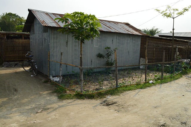 A house made of asbestos sheet is a standard feature in Jania. This is one of the houses in the displaced person's camp