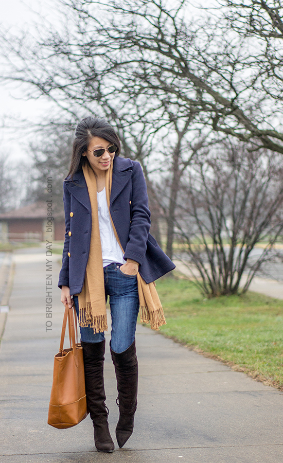navy pea coat, camel scarf, camel varsity cardigan, white tee, jeans, brown suede over the knee boots