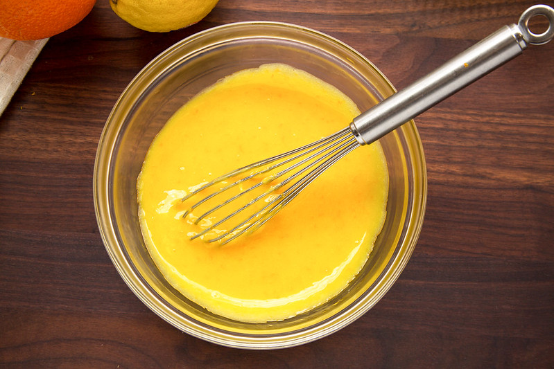 cooked orange curd in bowl