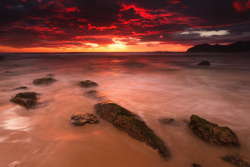 ocean red sea sky beach rock clouds sunrise spring spain sand