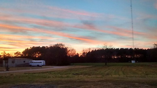 trees sunset sky color bus tree tower colors grass clouds nc lawn northcarolina fairmont radiotower robesoncounty amtower eveninglateafternoon