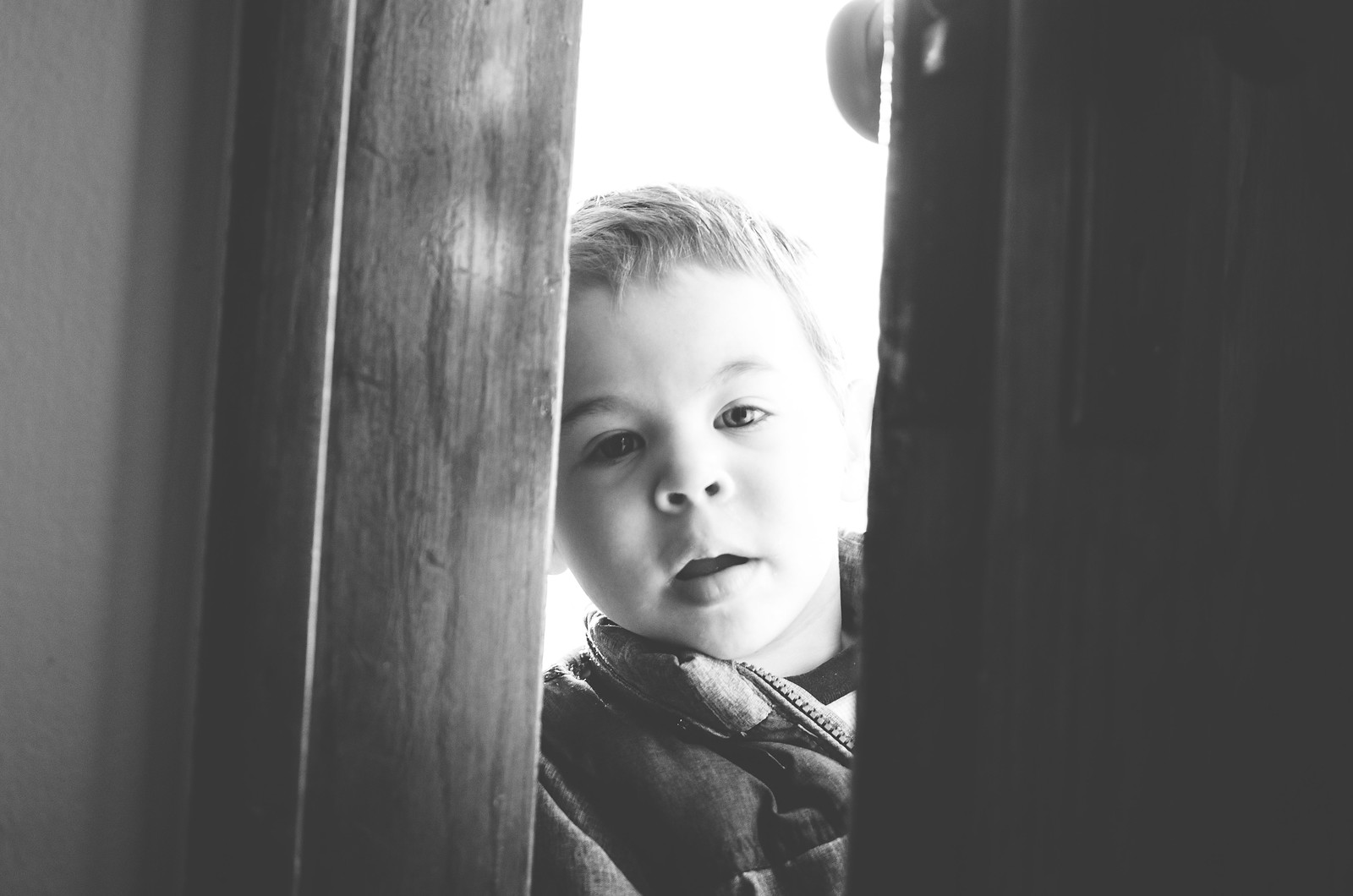 Micah in the doorway