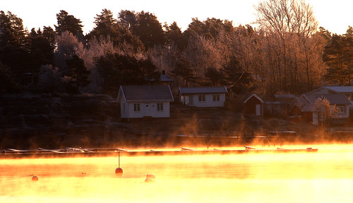 winter light sea sun cold water sunrise frost outdoor smoke huts freeze fjord hoar