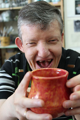 Tom PotteryWorks holding his own JusTea Tea Mug