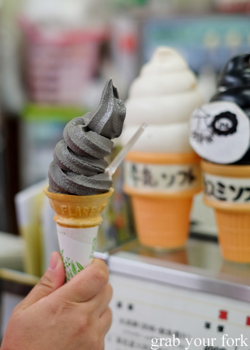 Squid ink soft serve ice cream at Hakodate Morning Market, Hokkaido