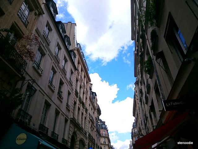 Blue sky between buildings