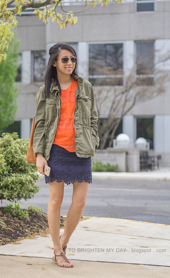 green military jacket, orange lace tank top, lace navy mini skirt, brown sandals, cognac brown tote