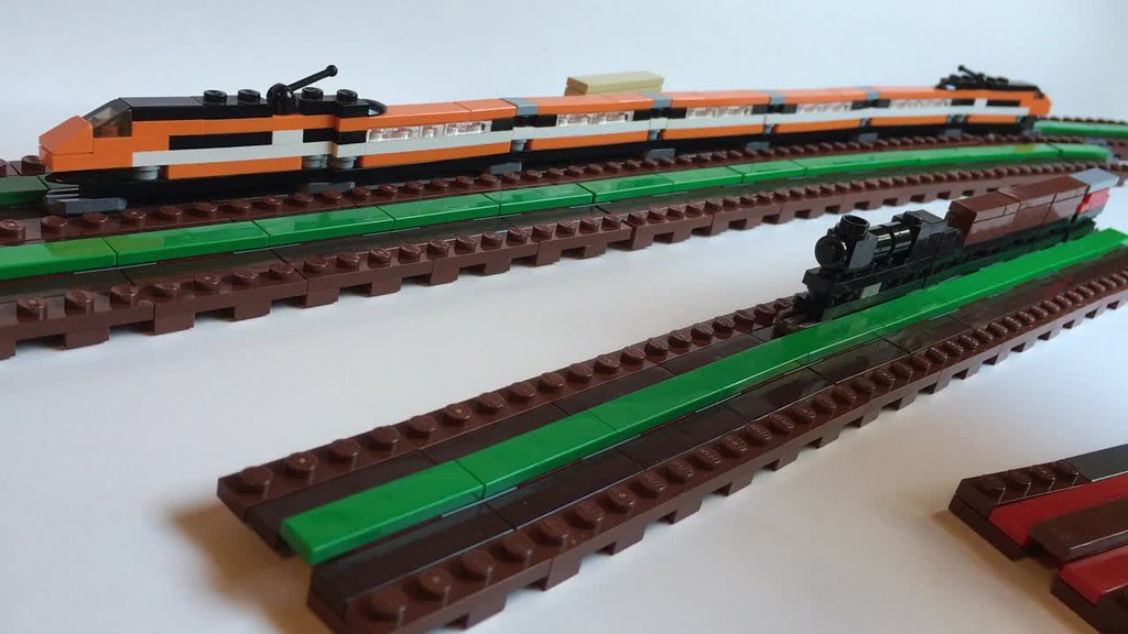 One stud wide trains built using LEGO(R) elements. Gliding, pushing, moving, switching.