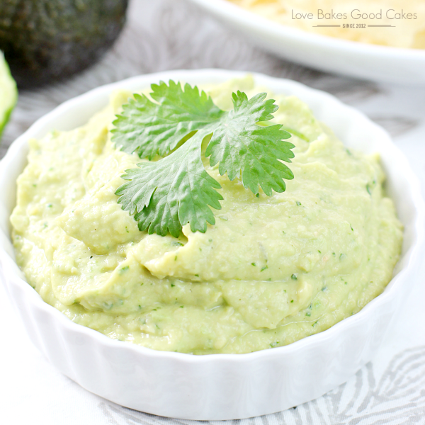 Spicy Avocado Hummus in a white bowl close up.