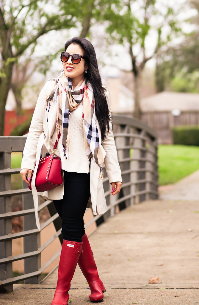 cute & little blog | petite fashion | classic double-breasted trench, burberry check summer scarf, black jeans, red hunter rain boots, red studded crossbody bag | rainy day spring outfit