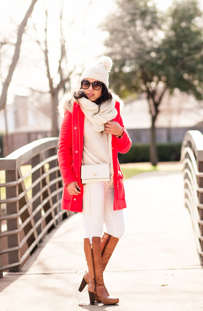 cute & little blog | petite fashion | white pom beanie, j.crew chateau fur hood parka, white infinity scarf, white knit sweater, white jeans, cognac tall boots | winter outfit