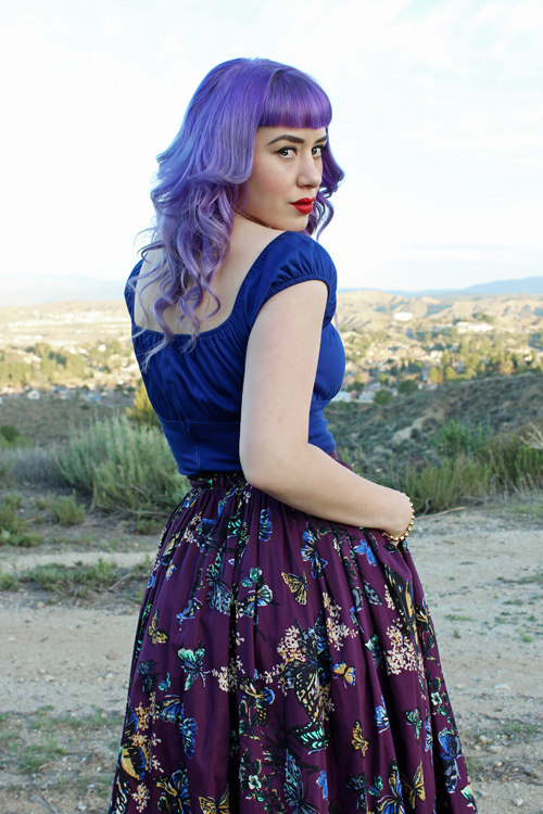 Pinup Girl Clothing Pinup Couture Peasant Top in Royal Blue Jenny Skirt in Moth Print