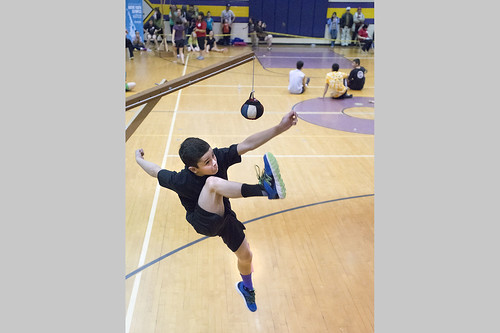 Shane Fortune competes in the one-foot high kick for the Kenaitze Indian Tribe’s Native Youth Olympics team during the tribe's invitational meet on Jan. 25, 2014.