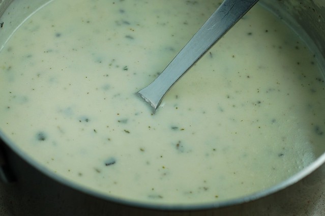Sage and thyme-infused béchamel sauce for the butternut squash lasagna with leeks by Eve Fox, The Garden of Eating, copyright 2016