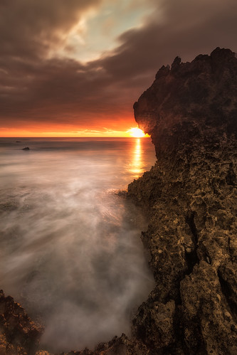 ocean sea beach rock clouds sunrise spain waves foam undercurrent
