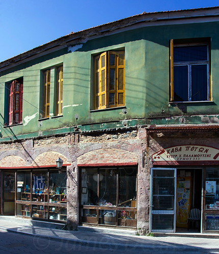 street windows history retail architecture landscape island europe commerce arch greece shutters shops roads lesbos