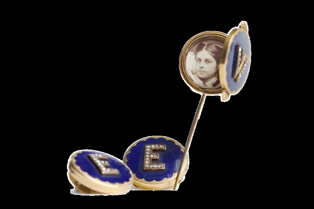 Cufflinks with case of gold enamel and rose diamonds. The "W" and "E" initials are probably for Wilhelmina and their two daughters—Ebba and Ellen. The third daughter, Irma, probably wasn't born at the time.