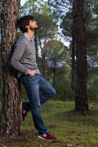 trees boy sunset portrait man color male beautiful field grass fashion vertical modern rural standing forest beard person one countryside spain adult serious farm profile young thoughtful handsome guillermo pines attractive casual farmer lying granadilla guille extremadura caceres eduardoestellez estellez