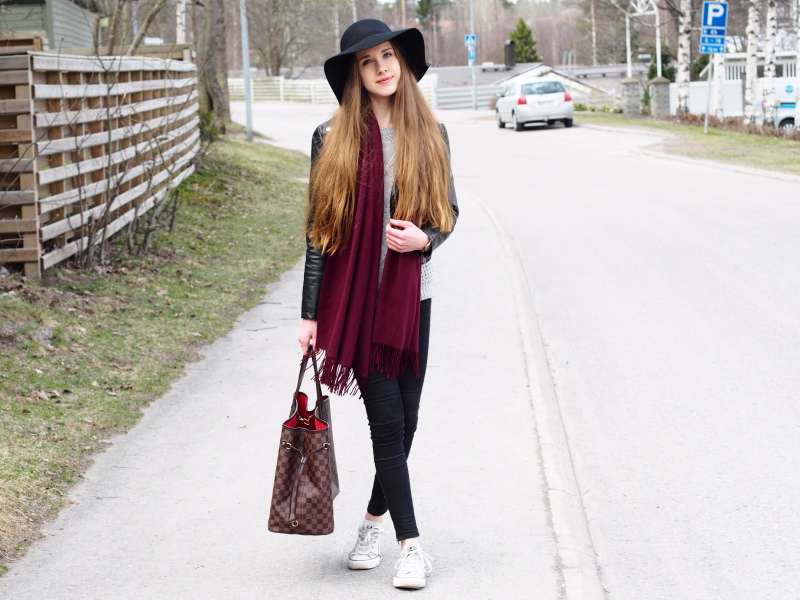 Sweater, skinny jeans, leather jacket, floppy hat, Converse shoes, Neverfull bag and coral lips to brighten up the face