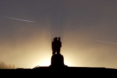 sky sun statue sunrise scotland highlands memorial commando aircrafttrails