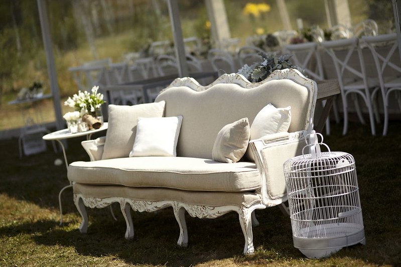 Vintage wedding furniture for an outdoor rustic wedding | Photo by Blumenthal Photography | Read this real wedding on I take you - UK wedding blog