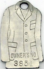 Suit-shaped charge coin