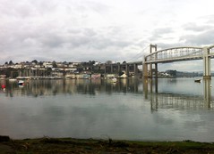 The Royal Albert Rail Bridge and the Tamar Road Bridge linking Devon with Cornwall on a calm January morning