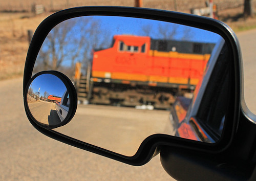railroad orange black reflection yellow train truck mirror crossing gates railway tags bnsf activated gevo es44ac