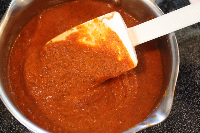 Remove pan from heat and let sauce cool a bit while you prepare your dough & toppings.