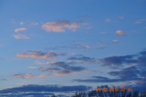blue sky sun moon yellow clouds sunrise