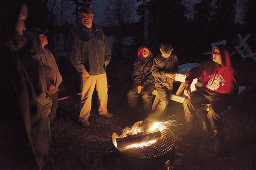 Participants in last fall’s Moose Camp gather around the fire.