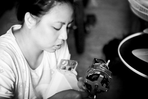 camera blackandwhite reflection girl fix philippines working streetphotography indoor littlegirl fixing streetphotographer ilocossur tagudin canon70200 canoneos5d earldolphy litratisticaimages cherrydolphy